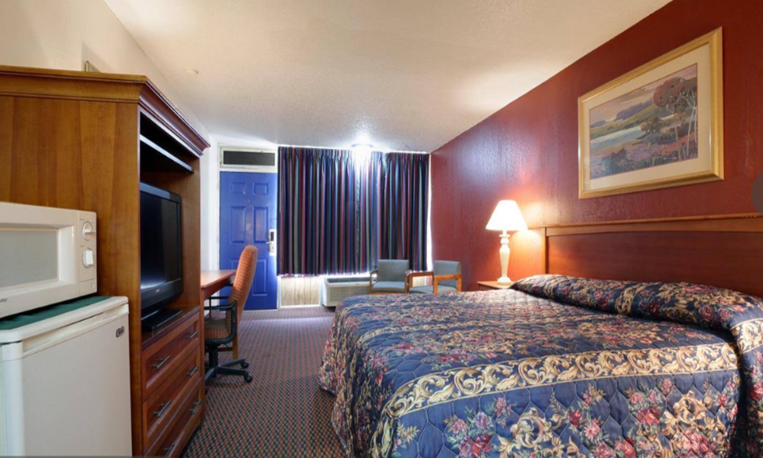 Comfortable guest room at Weatherford Inn